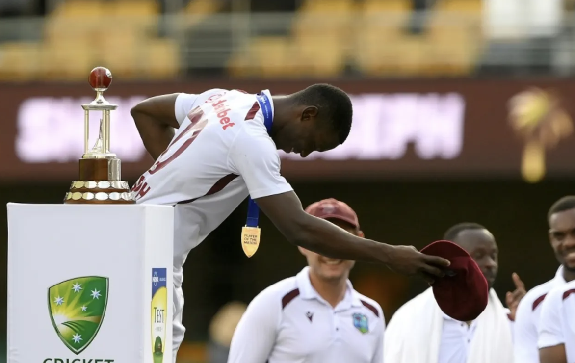 Shamar Joseph of West Indies Cricket team bowing on the podium